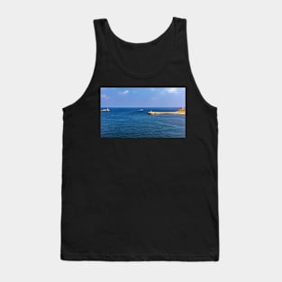 Boat going in turquoise sea between lighthouses Tank Top